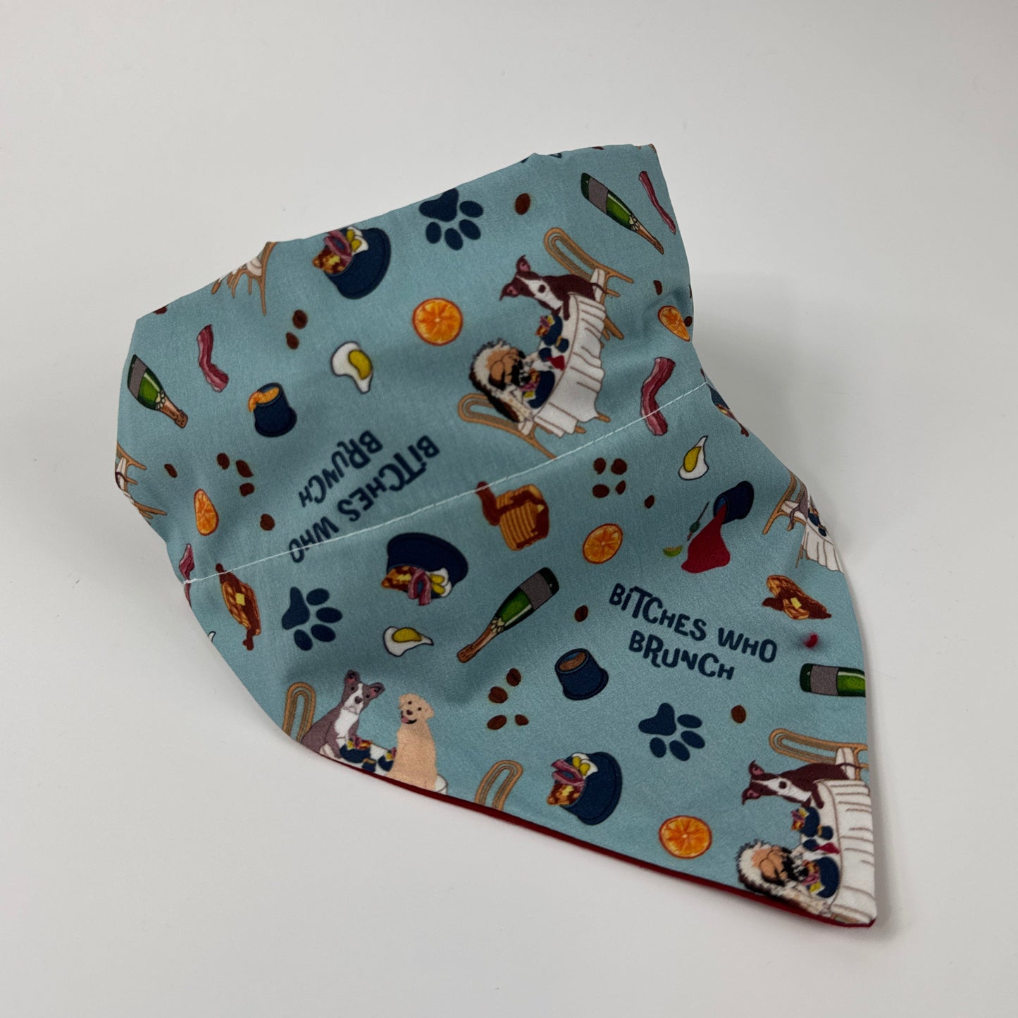 Fabric with dog-themed pattern on a white background
