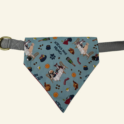 Triangle-shaped pet toy with patterned fabric and gray strap on a white background